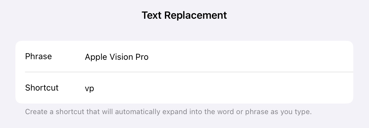 Screenshot showing iPad text replacement settings with Phrase “Apple Vision Pro” and Shortcut “vp”