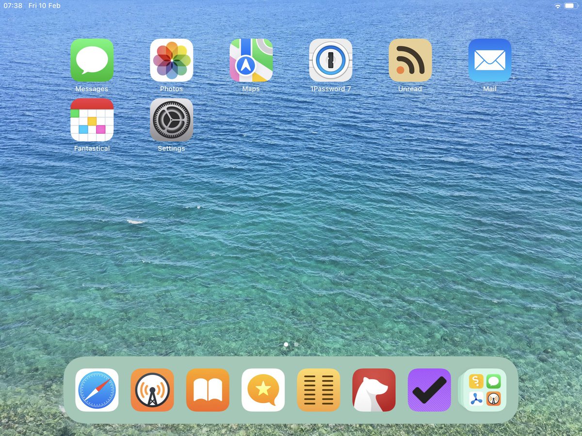 Screenshot of iPad home screen in landscape showing first row: Messages, Photos, Maps, 1Password, Unread, Mail; and second row Fantatical, Settings.
