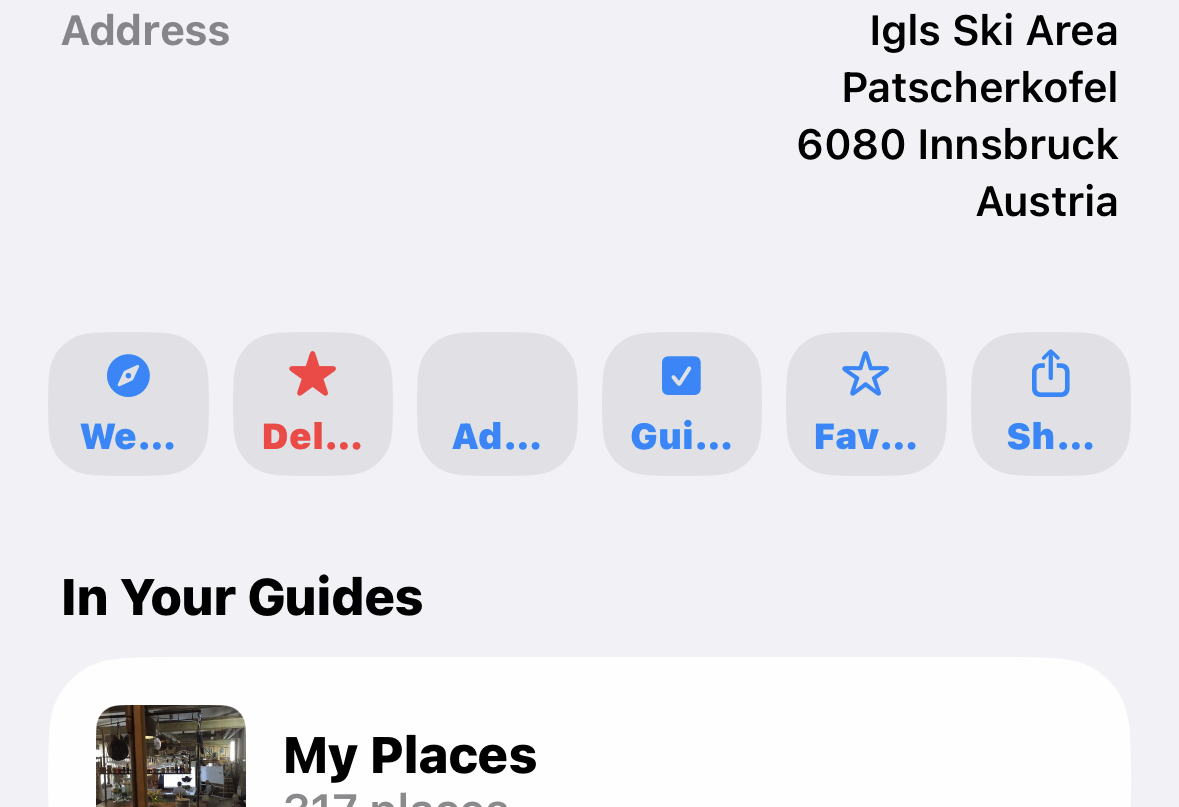 Screenshot of Apple Maps place detail showing six buttons in a row with truncated labels “We…, Del…, Ad…, Gui…, Fav…, Sh…”