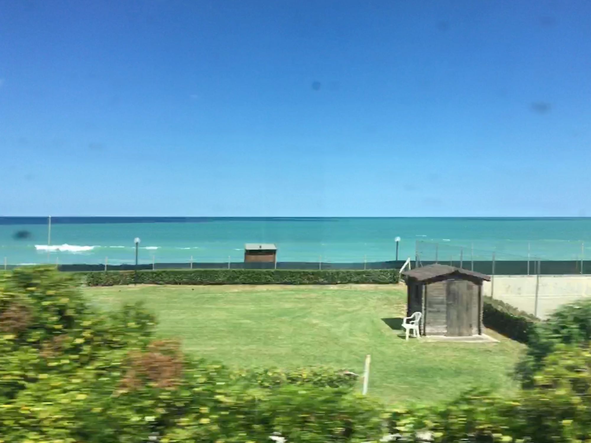 Photo of the Adriatic sea from a speeding train