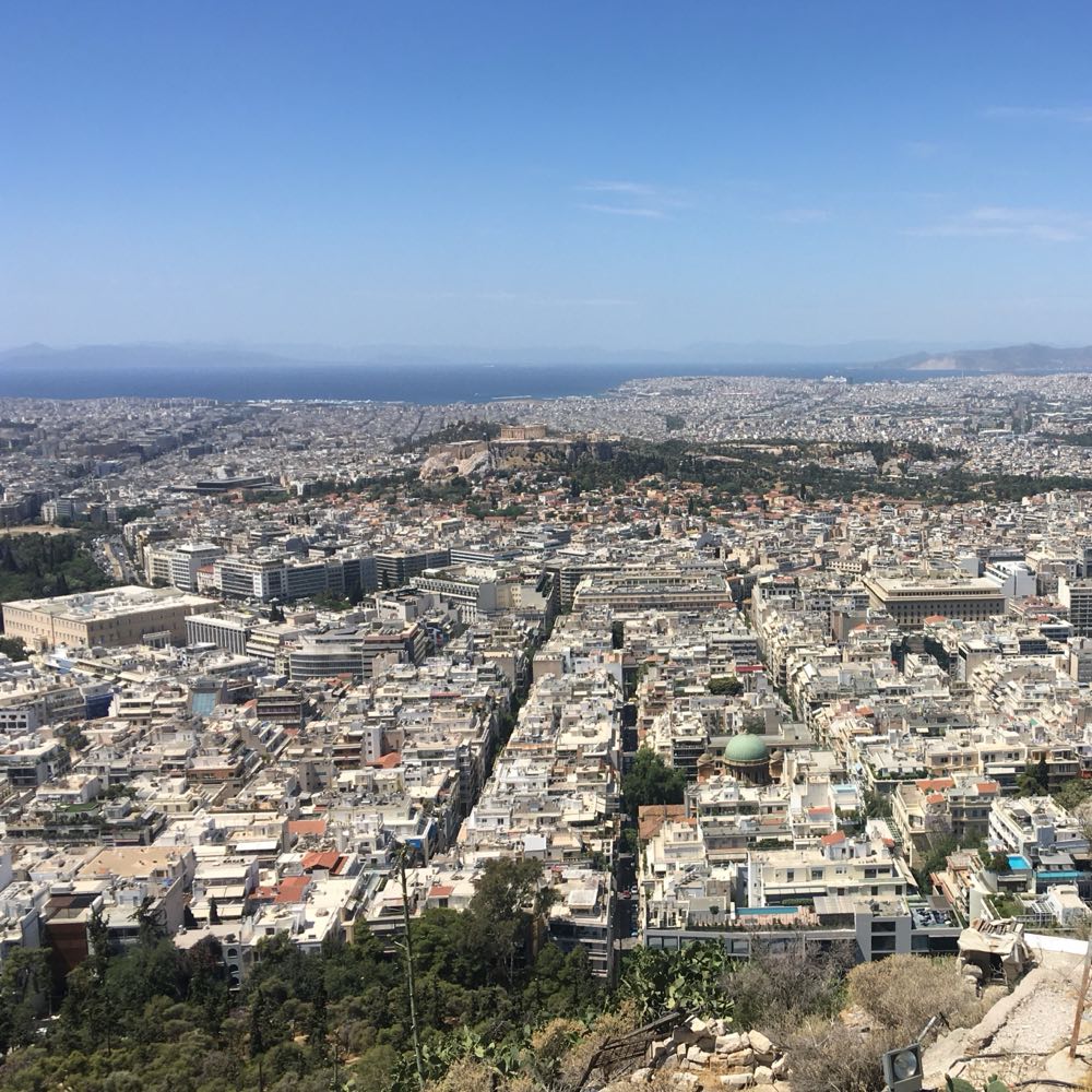 Daytime photo of Athens overlooking the acropolis