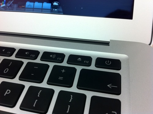 Photo of the upper right of a MacBook Air keyboard, with the eject key shown in the centre of the image
