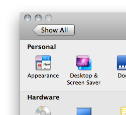 System Preferences with just a Show All button at the left end of its toolbar. The button points to the left.